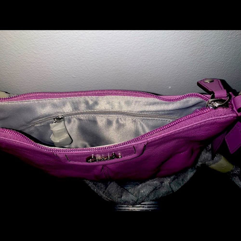 Coach purse color is purple Brand new with tag